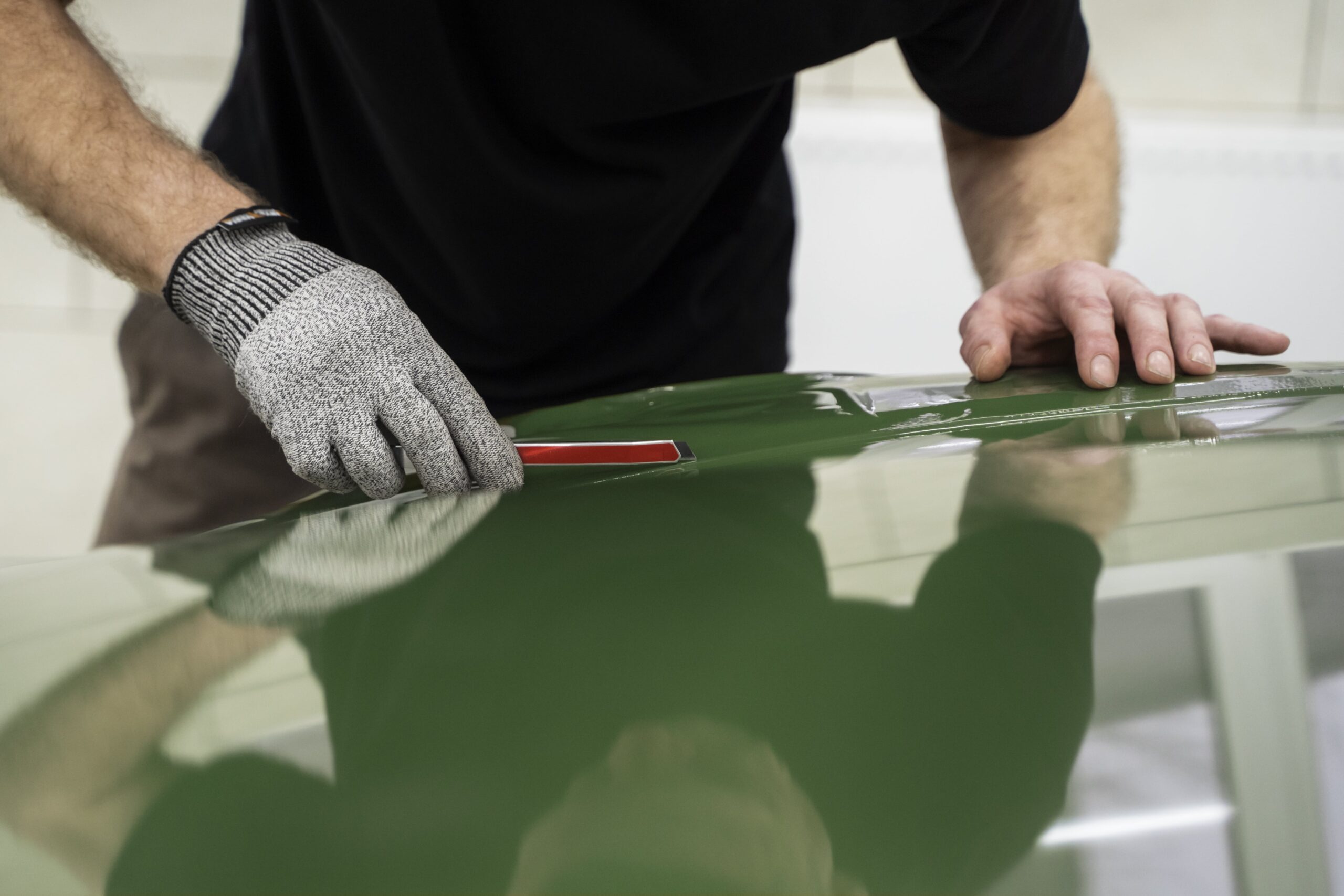 person-working-car-wrapping-min
